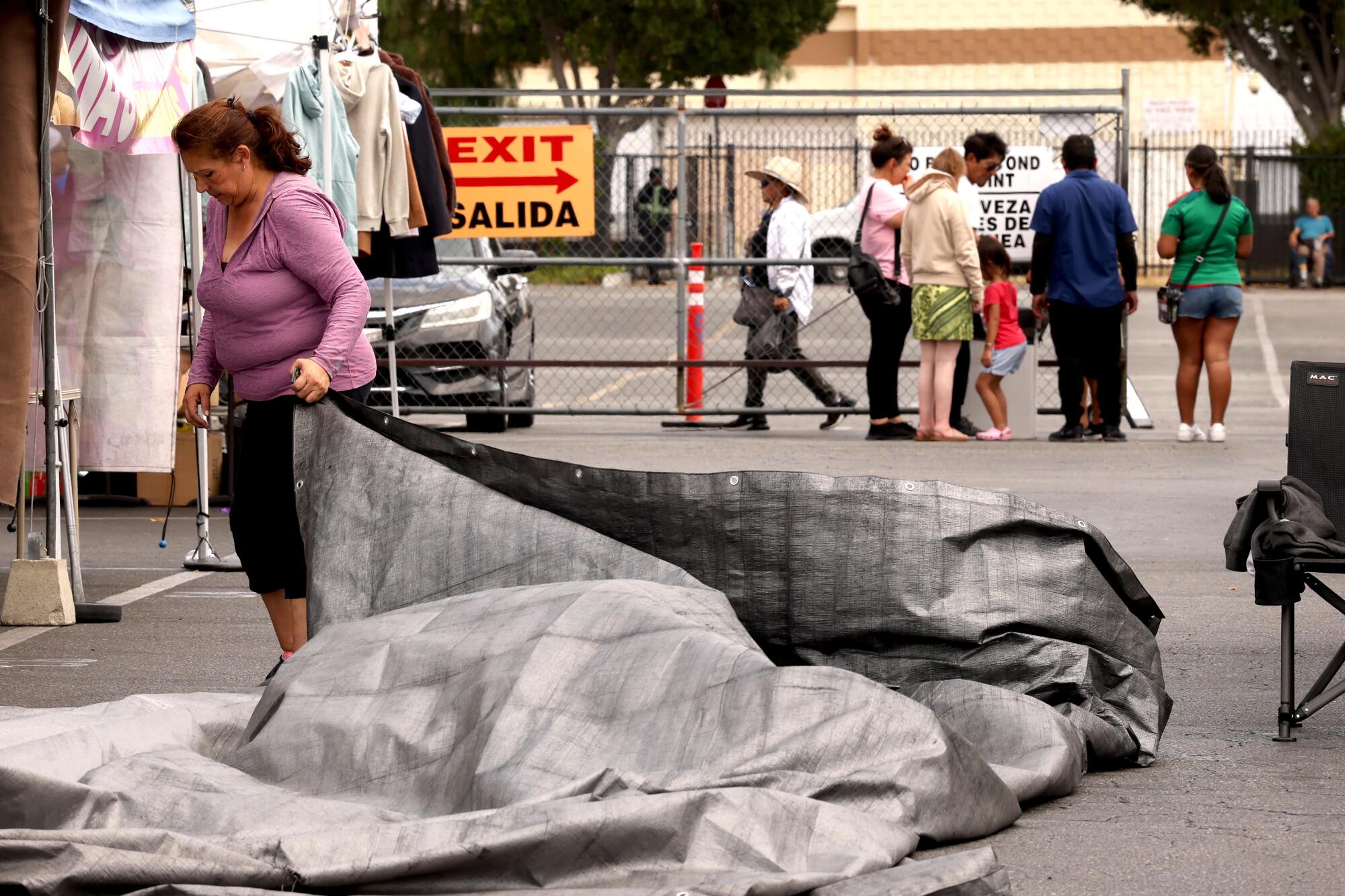 A vendor packs up early at the San Fernando Swap Meet.