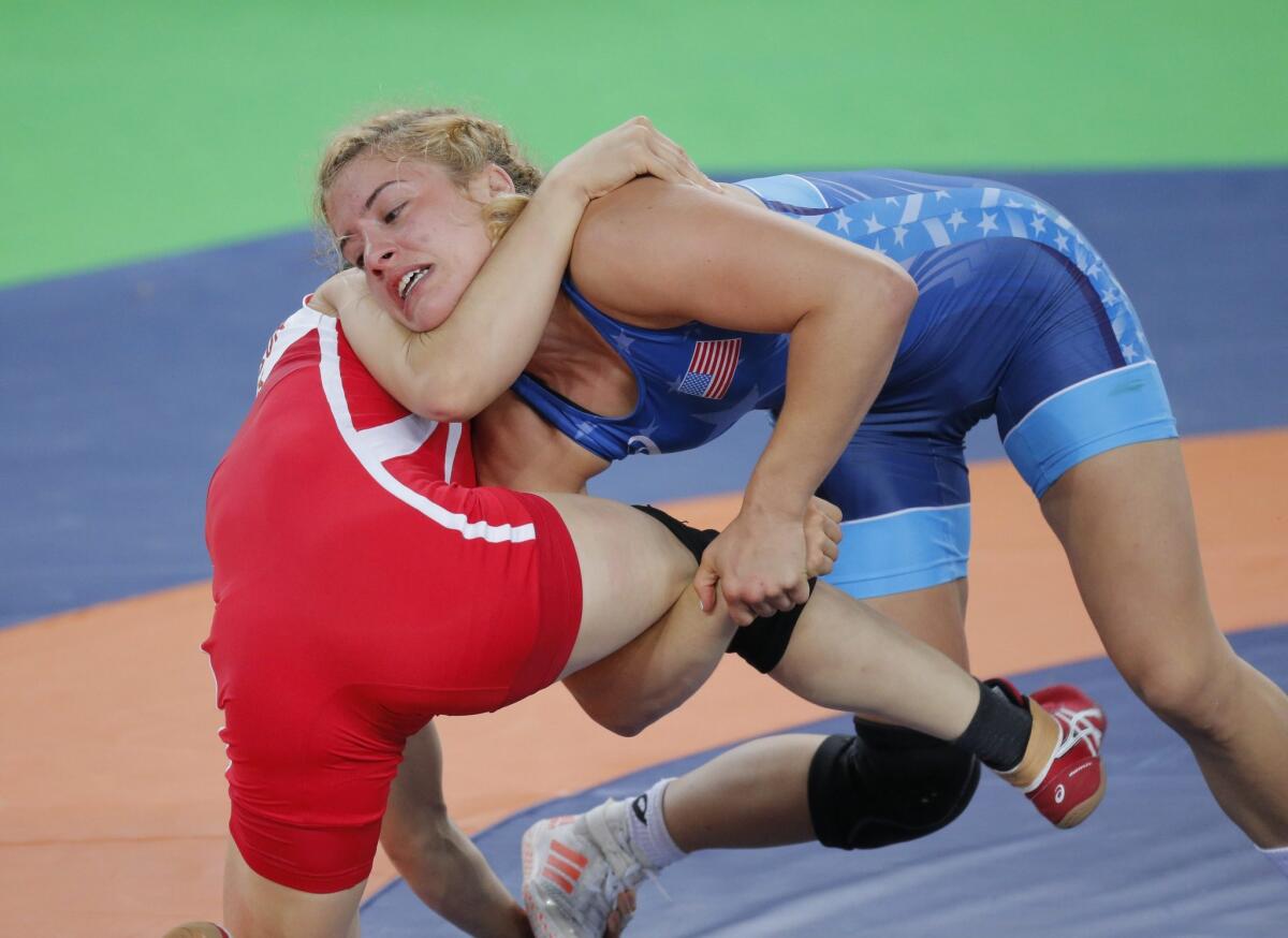 Helen Maroulis of the U.S., right, wrestles North Korea's Myong Suk Jong.