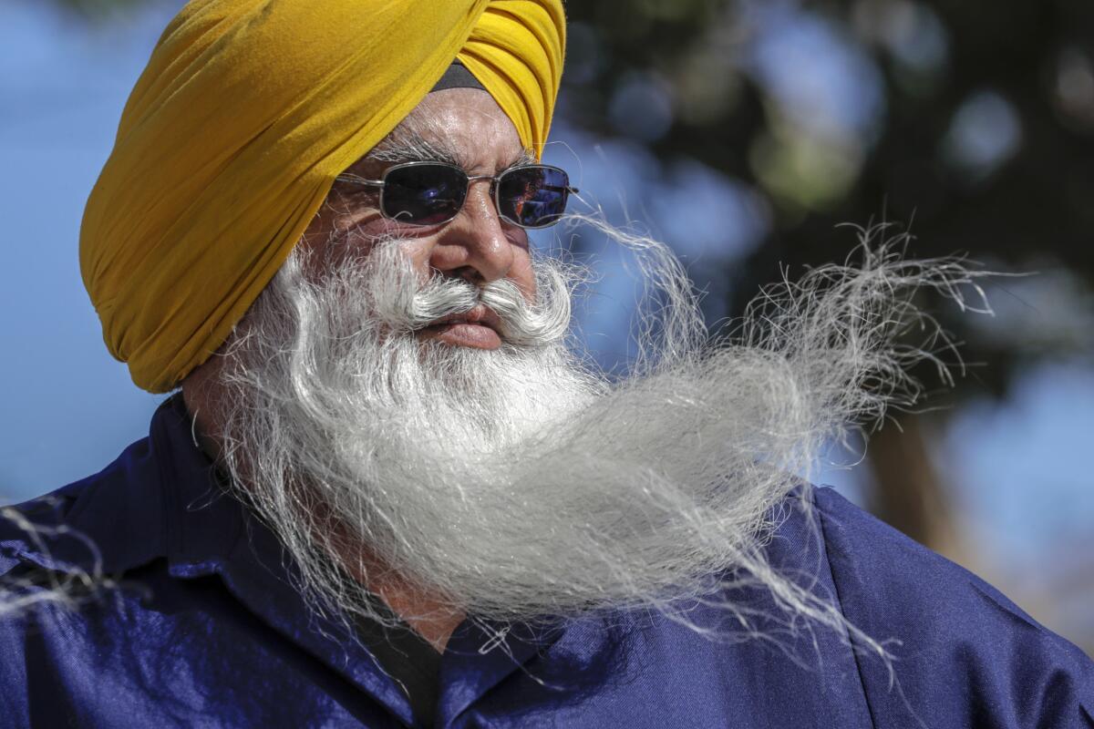 Baljit Singh, who has been driving trucks for 30 years, at Nagar Kirtan festivities in Jurupa Valley. (Irfan Khan / Los Angeles Times)