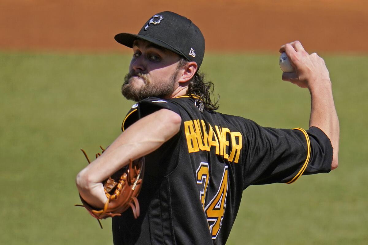 Pittsburgh Pirates pitcher JT Brubaker delivers during the first inning of a spring training exhibition baseball game against the New York Yankees in Tampa, Fla., Saturday, March 13, 2021. (AP Photo/Gene J. Puskar