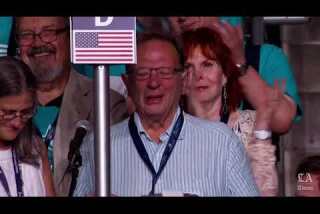 An emotional Larry Sanders casts roll call vote for his brother Bernie at the Democratic National Convention