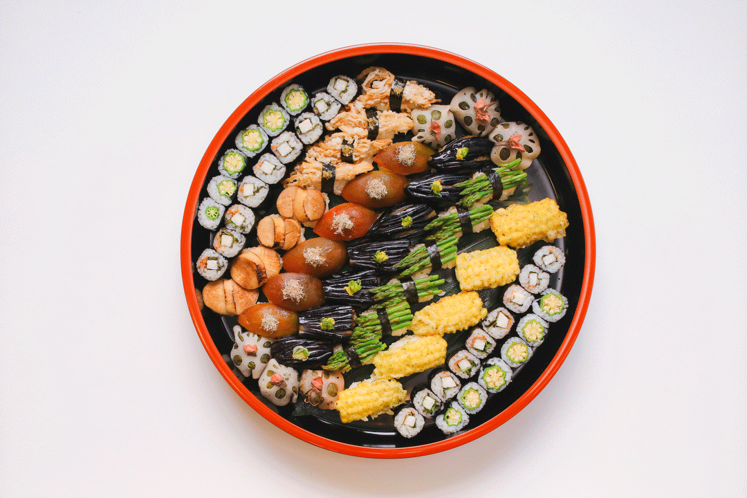 A tray full of vegan sushi