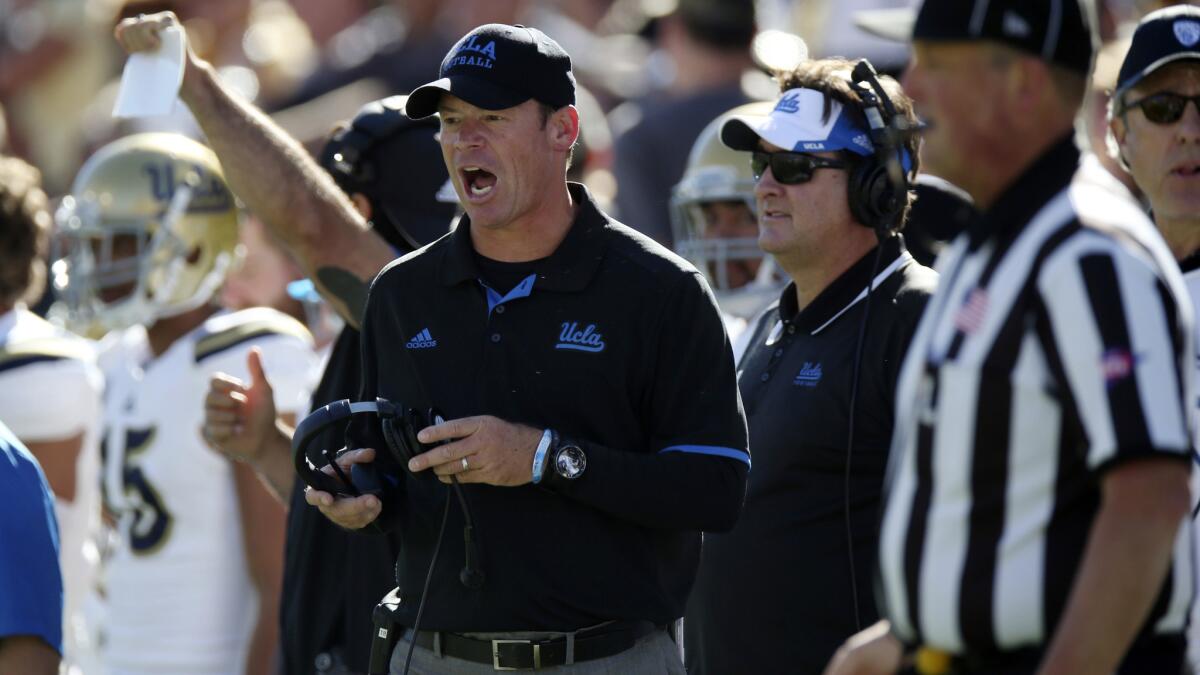 UCLA Coach Jim Mora argues a call during the Bruins' win over Colorado on Saturday.