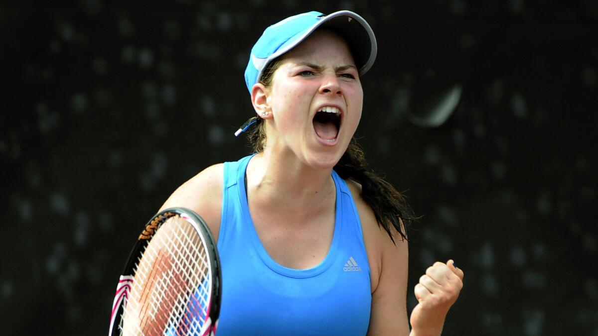 UCLA's Kyle McPhillips celebrates the Bruins' NCAA women's tennis championship victory over North Carolina on Tuesday.
