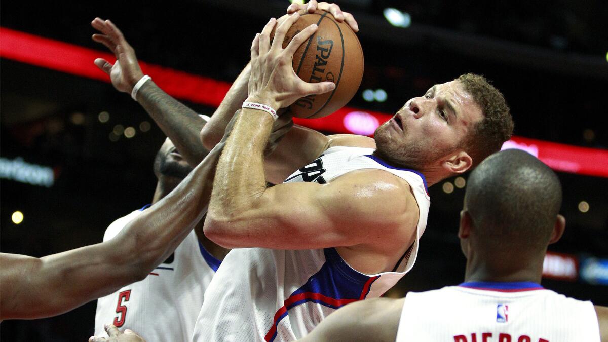 Clippers forward Blake Griffin pulls down a defensive rebound against the Utah Jazz during a Nov. 25 game at Staples Center.