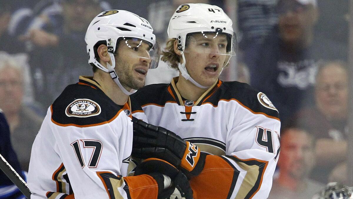 Ducks defenseman Hampus Lindholm, right, has four goals and 17 points, and has played in all but one of the Ducks' 44 games so far this season.