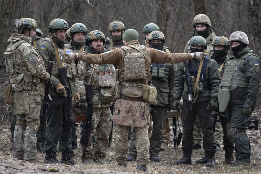 Ukrainian servicemen attend combat training in Kyiv region, Ukraine, Friday, March. 3, 2023. (AP Photo/Efrem Lukatsky)