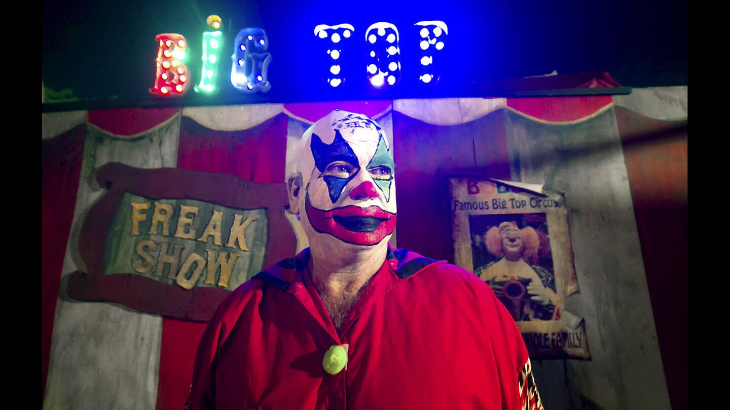 Creator William "Jay" Horsky looks over the crowd ready to enter the circus big top CarnagEVIL during this year's Hauntington Beach event.