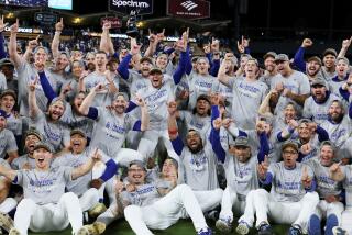 LOS ANGELES, CALIFORNIA - OCTOBER 20: The Los Angeles Dodgers pose for a team photo.