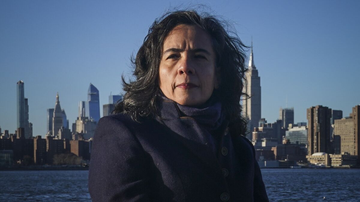 Dr. Oxiris Barbot, a pediatrician and former health commissioner for New York City during the coronavirus outbreak, poses for a portrait in the Brooklyn borough of New York, Monday Dec. 7, 2020. Barbot left her job as commissioner in August amid a clash with Democratic Mayor Bill de Blasio. (AP Photo/Bebeto Matthews)