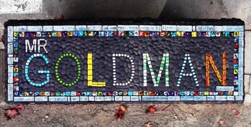 Top view of the mosaic bench created in honor of Muirland Middle School teacher Craig Goldman