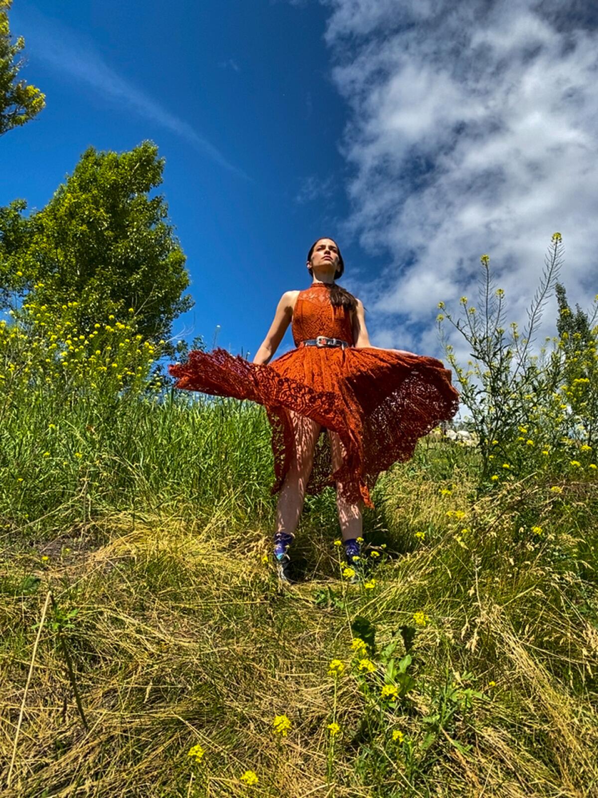 Melanie Scrofano on a hillside 