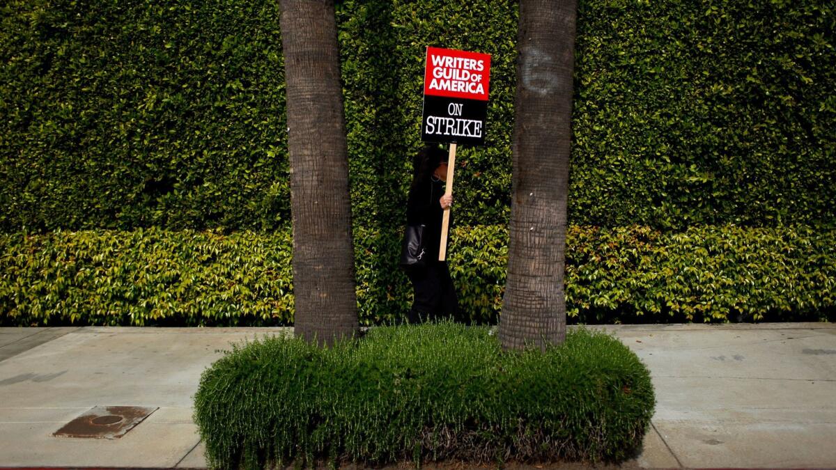 A Writers Guild of America picketer demonstrating during the union's last strike, which began in 2007 and lasted for 100 days.