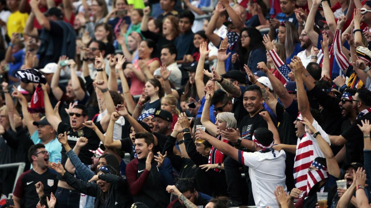 Fans cheer after the first goal scored by the U.S. women's national soccer team against Belgium.