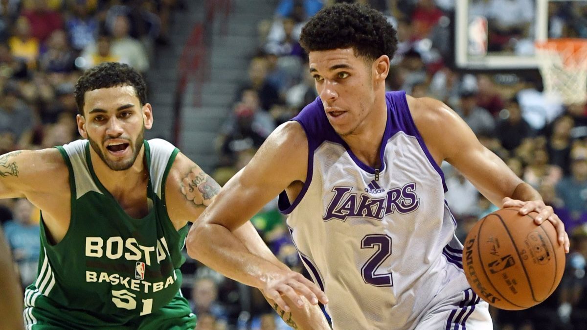 The Lakers' Lonzo Ball, shown driving the ball against the Celtics' Abdel Nader during a summer league game, "can be one of the best rookies in the league,” according to Jason Kidd.