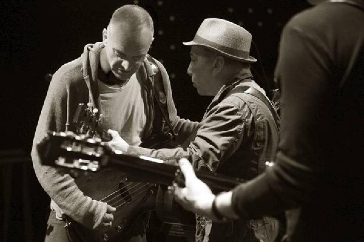 Sting, left, and Paul Simon will tour together in 2014, including a Feb. 15 stop at the renovated Forum in Inglewood.