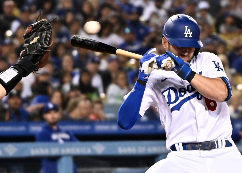 Dodgers' Trea Turner is nearly hit by a pitch against the Pittsburgh Pirates.