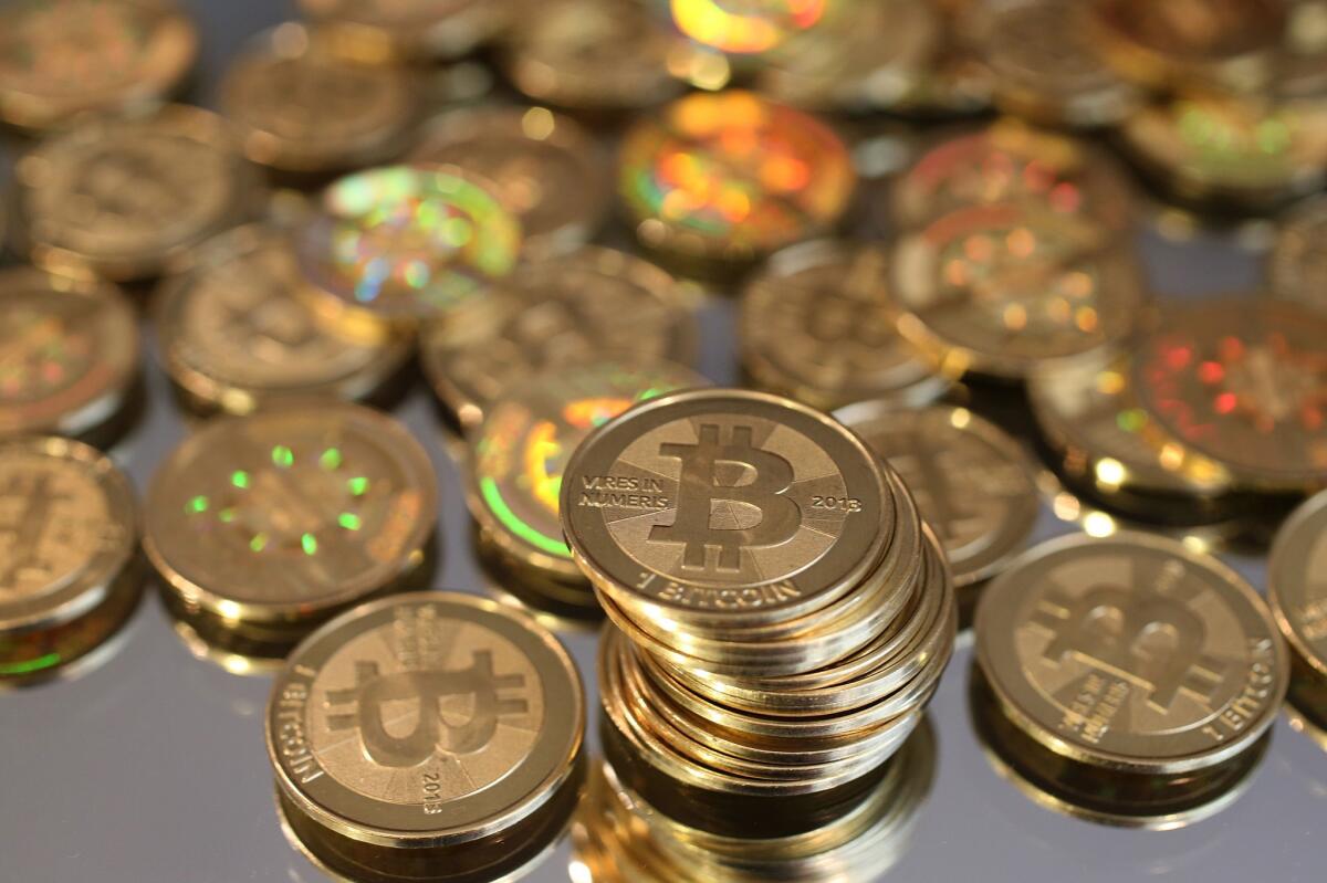 A pile of bitcoins minted by software engineer Mike Caldwell are shown in his shop in Sandy, Utah, on April 26, 2013.