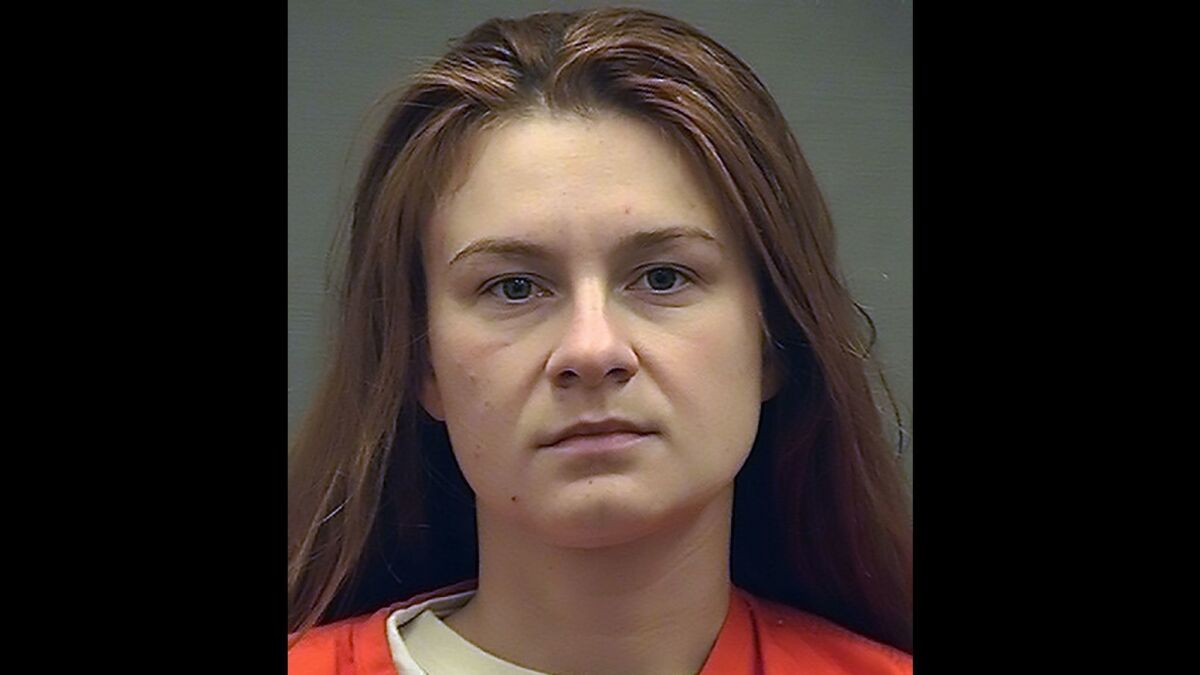 A booking photo shows Maria Butina, an admitted Russian agent who built a network of contacts via the National Rifle Assn. and other groups. She was sentenced for acting as an illegal foreign agent.