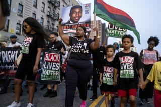 FILE - Activists with Black Lives Matter protest in the Harlem neighborhood of New York, Tuesday, July 16, 2019, in the wake of a decision by federal prosecutors who declined to bring civil rights charges against New York City police Officer Daniel Pantaleo, in the 2014 chokehold death of Eric Garner. The decision was made by Attorney General William Barr and announced one day before the five-year anniversary of his death, officials said. (AP Photo/Craig Ruttle, File)
