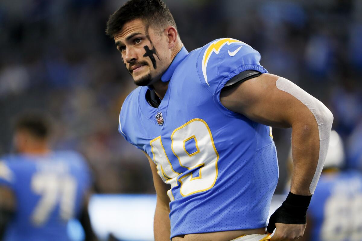 Chargers linebacker Drue Tranquill gets loose before a game.