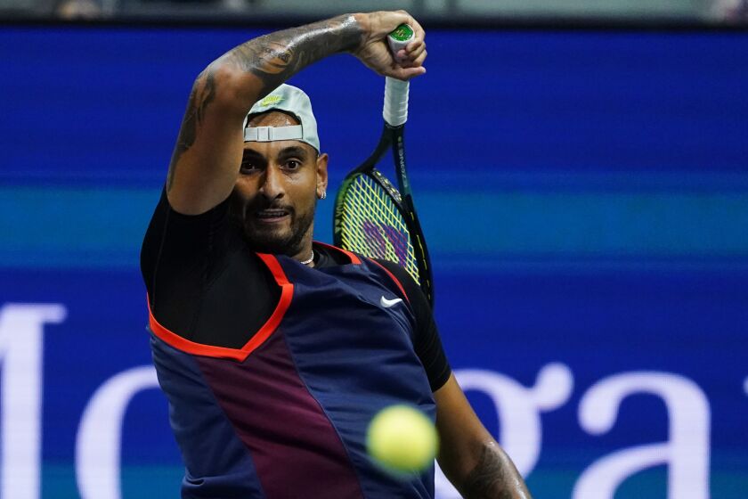 Nick Kyrgios, of Australia, returns to Karen Khachanov, of Russia, during the quarterfinals of the U.S. Open tennis championships, Tuesday, Sept. 6, 2022, in New York. (AP Photo/Frank Franklin II)