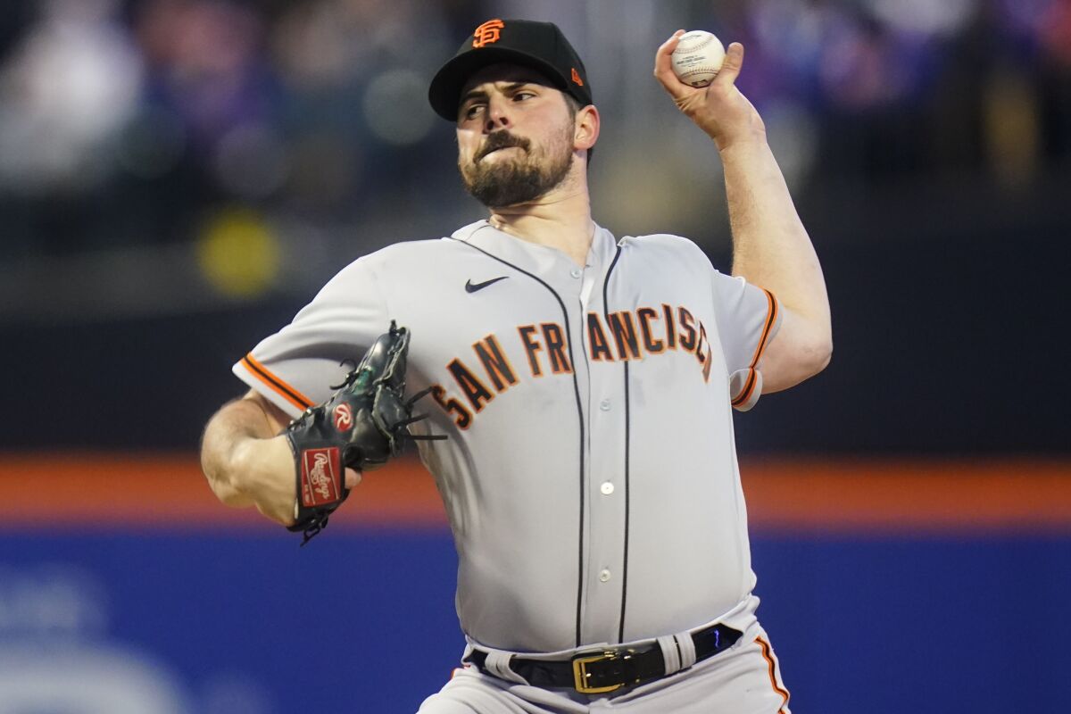 San Francisco Giants' Carlos Rodon pitches during the first inning of the team's baseball game against the New York Mets on Wednesday, April 20, 2022, in New York. (AP Photo/Frank Franklin II)