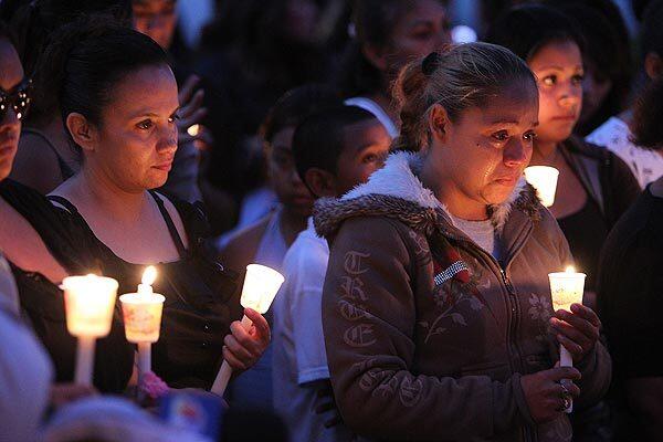 Candlelight vigil for teacher Rigoberto Ruelas
