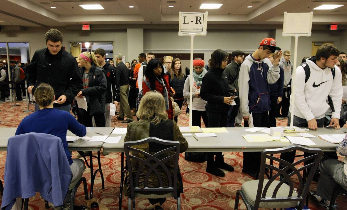 Voters wait in long lines at the polls at Ohio State University in Columbus, Ohio.