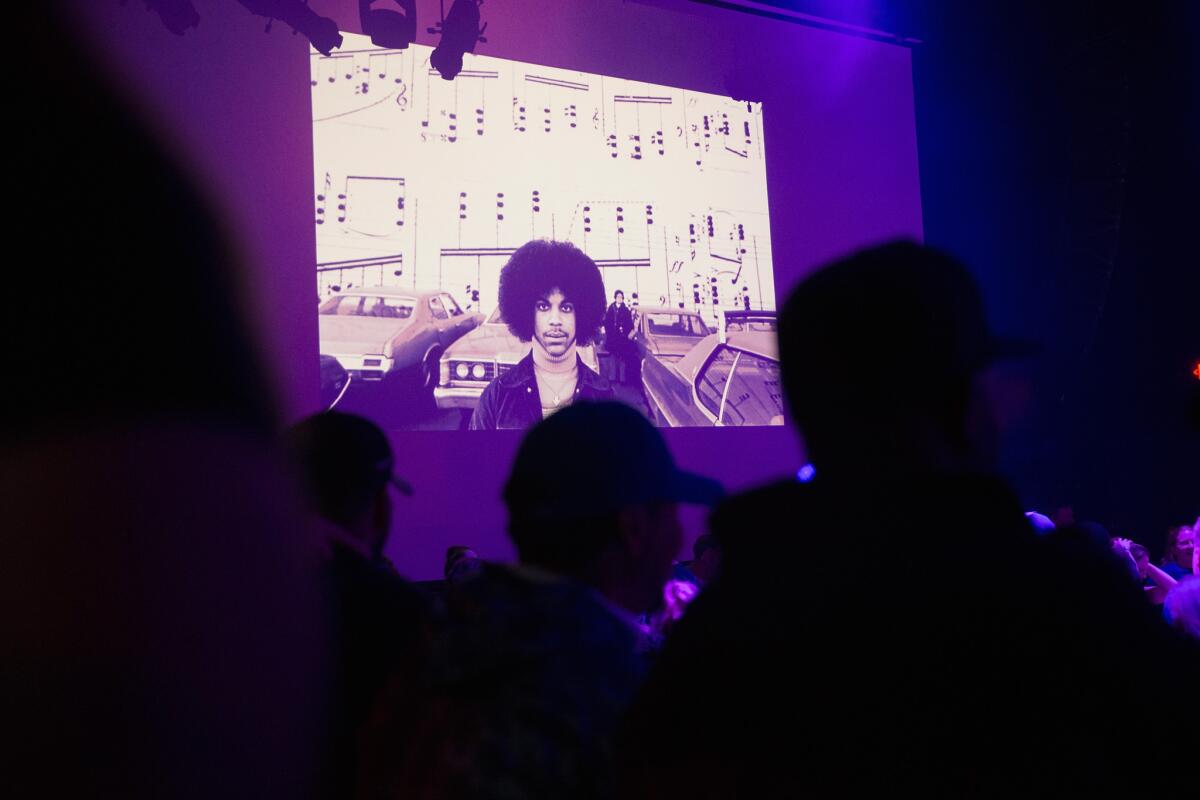 Prince is honored with a purple slide show at the First Avenue nightclub in Minneapolis, where he got his start.