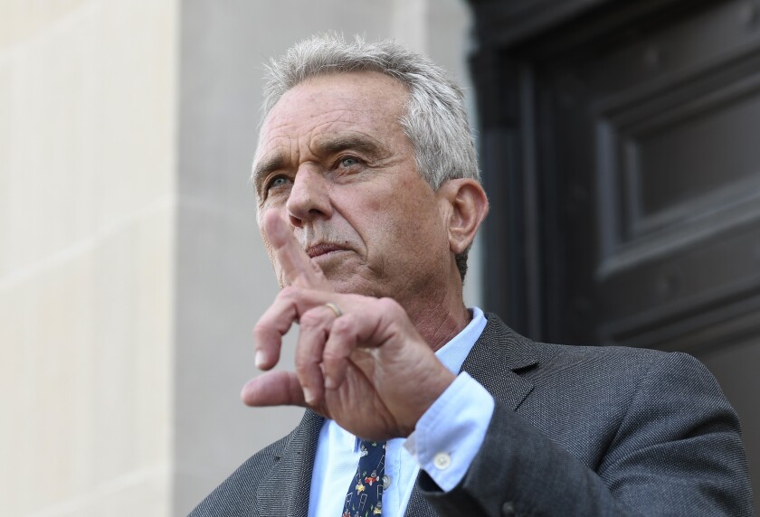 FILE - Robert F. Kennedy, Jr. speaks after a hearing challenging the constitutionality of the state legislature's repeal of the religious exemption to vaccination on behalf of New York state families who held lawful religious exemptions, during a rally outside the Albany County Courthouse, Aug. 14, 2019, in Albany, N.Y. Kennedy is apologizing for suggesting things are worse for people today than they were for Anne Frank, the teenager who died in a Nazi concentration camp after hiding with her family in a secret annex for two years. Kennedy’s comments were made at a Washington rally on Sunday put on by his anti-vaccine nonprofit group. (AP Photo/Hans Pennink, File)