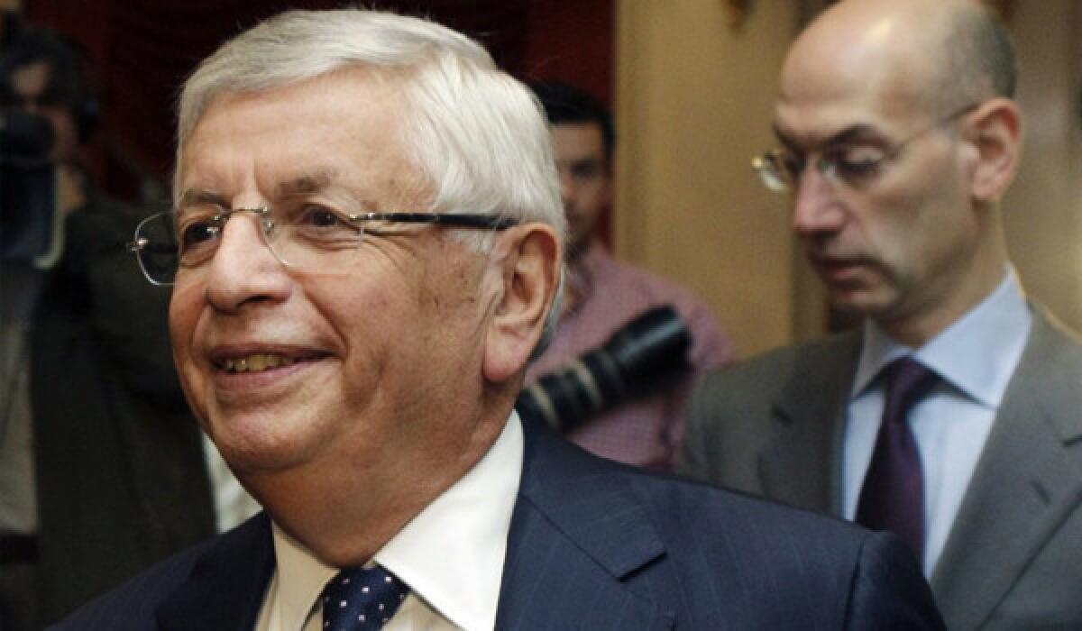 NBA Commissioner David Stern, with Deputy Commissioner Adam Silver in the background, has come down hard on the Spurs for sending four players home to San Antonio instead of Miami to the play the Heat.
