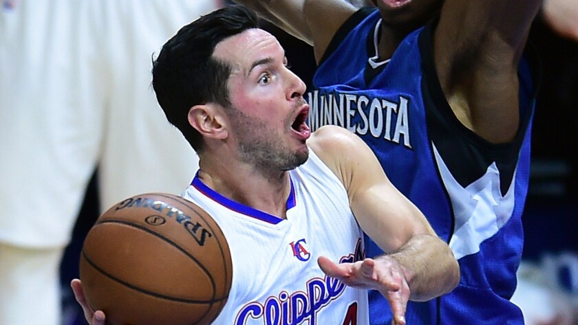 Clippers guard J.J. Redick drives to the basket during the Clippers' 127-101 victory over the Minnesota Timberwolves on Monday.