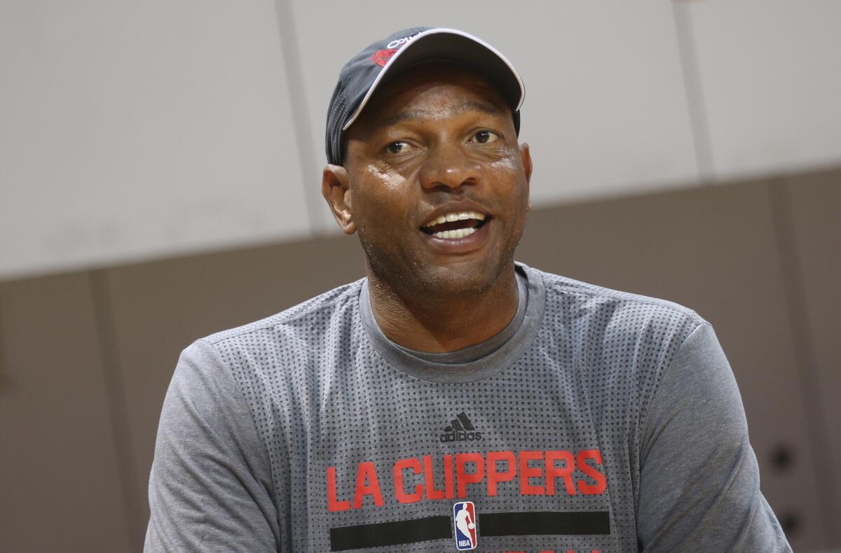 Doc Rivers speaks during a training session in Shenzhen, China, on Oct. 10, 2015.
