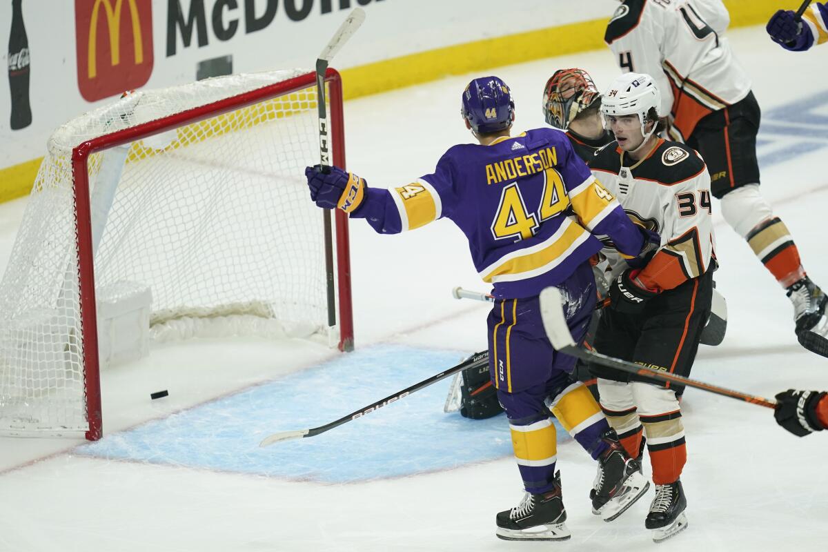Kings defenseman Mikey Anderson celebrates after scoring a goal against the Ducks at Staples Center on Monday.