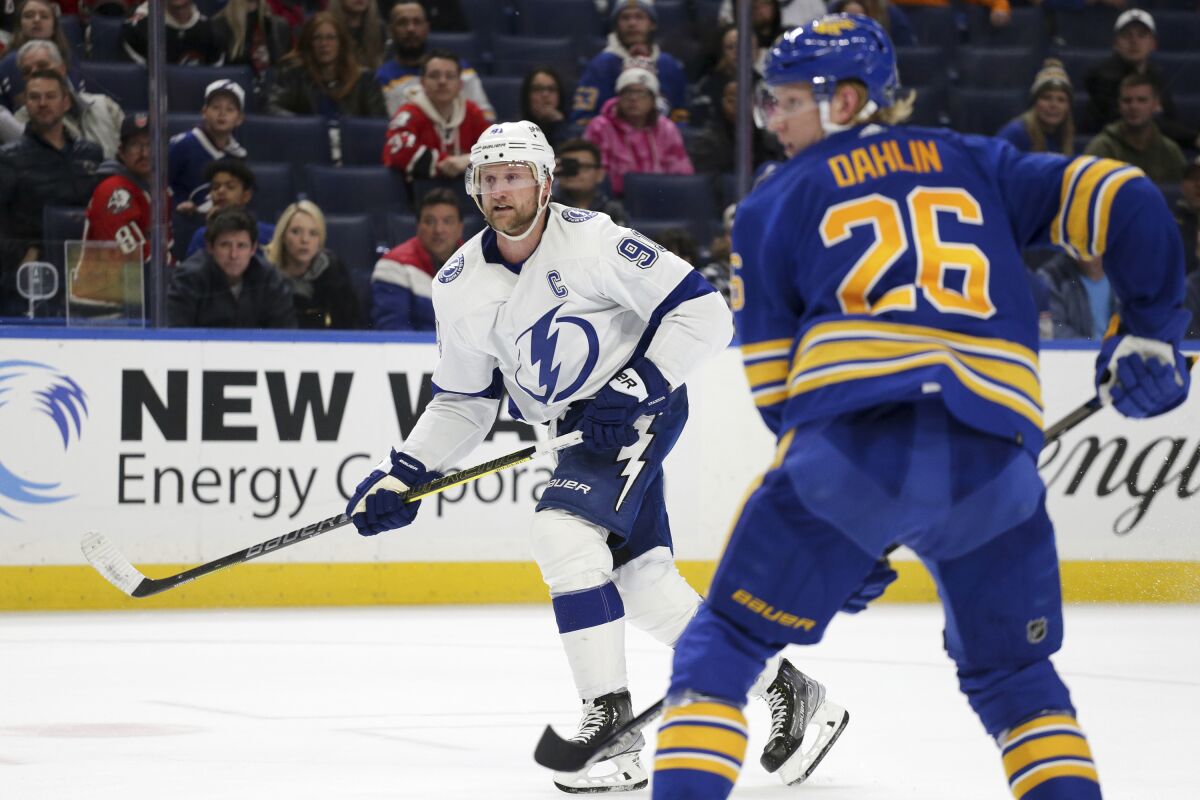 Tampa Bay Lightning center Steven Stamkos (91) scores the winning goal during overtime of an NHL hockey game against the Buffalo Sabres, Monday, Nov. 28, 2022, in Buffalo, N.Y. (AP Photo/Joshua Bessex)