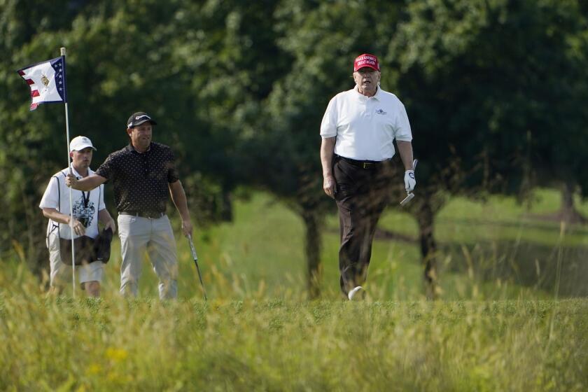 Former President Donald Trump plays golf at Trump National Golf Club in Sterling, Va., Tuesday, Sept. 13, 2022. (AP Photo/Manuel Balce Ceneta)