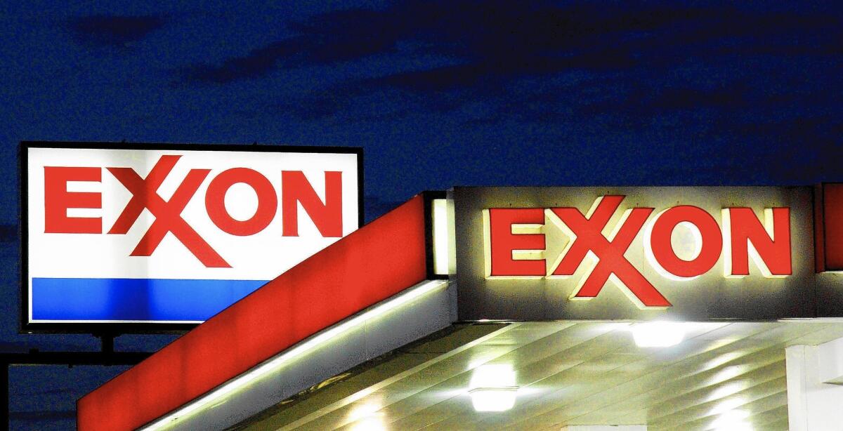 An international arbitration panel has awarded Exxon Mobil $1.6 billion for its seized Venezuelan assets. Above, an Exxon gas station in Manassas, Va.