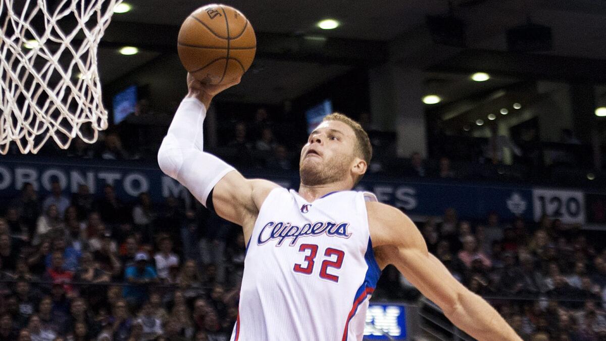 Clippers forward Blake Griffin dunks during a loss to the Toronto Raptors on Friday.