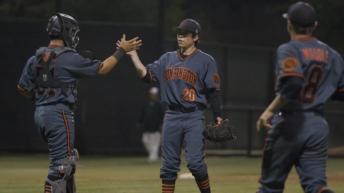 Huntington Beach High's Dylan Ramirez (20), seen here on April 21, 2017, threw five hitless innings in the Oilers' 1-0 shutout of Orange Lutheran on Wednesday.