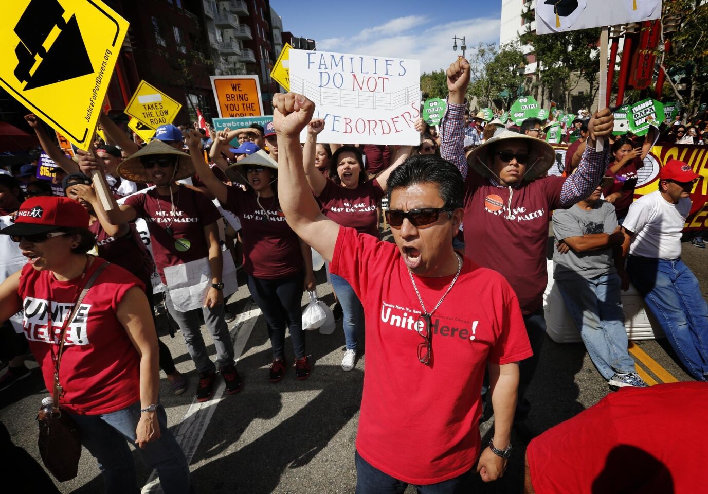 Protesters rally in Chinatown during May Day demonstrations.