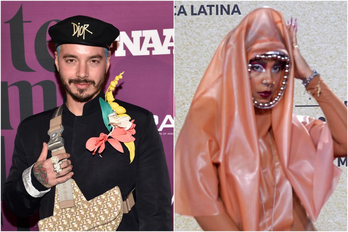 A man posing in a black outfit with colorful accents and a black beret; a woman posing in a pink outfit and head scarf