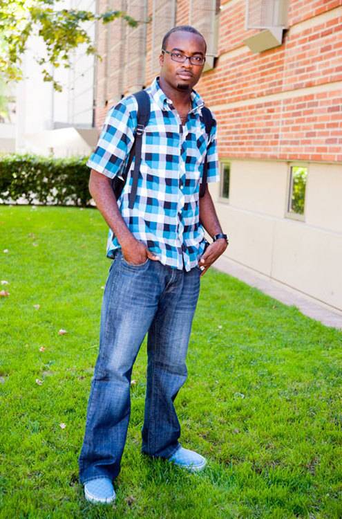 Gbenga Elehinase, 27, from Nigeria, wears Vans, a Billabong shirt and Guess watch.