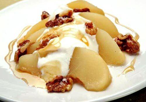 Honey-poached pears with Greek yogurt and toasted walnuts