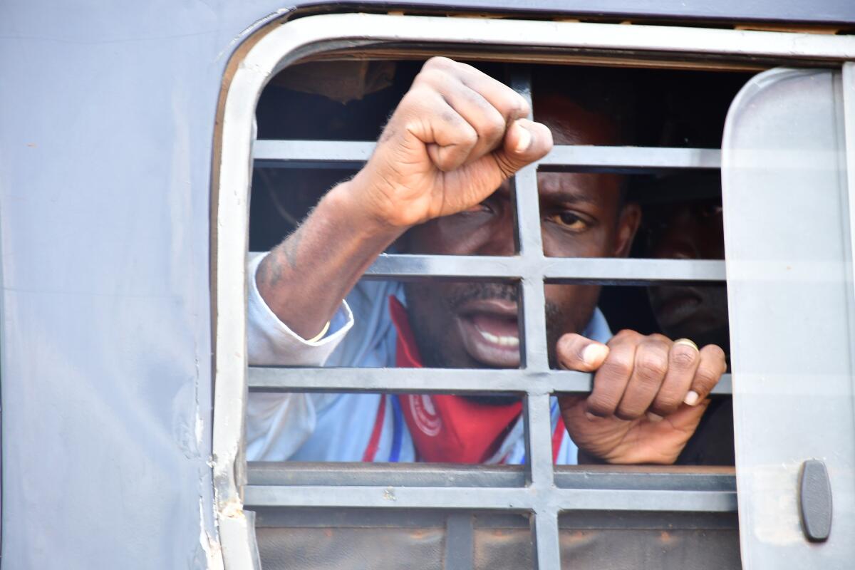 Ugandan pop star and presidential candidate Bobi Wine in a police van (from the doc "Bobi Wine: The People's President")