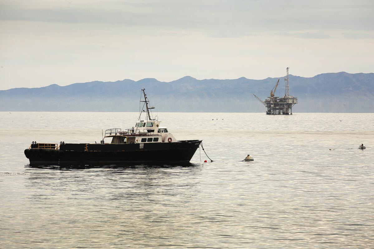 Boats shuttle workers to oil platforms off the coast of Santa Barbara.