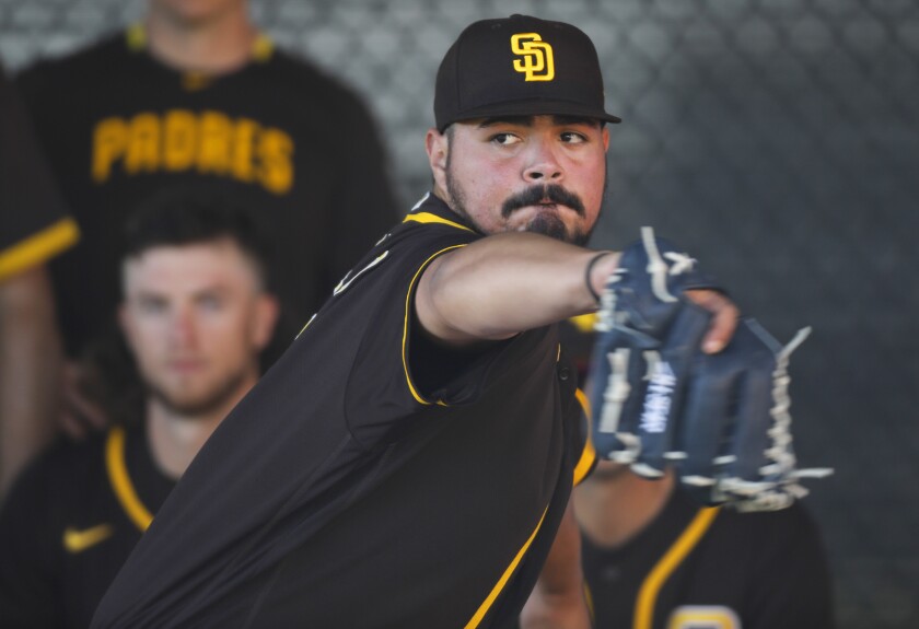 San Diego Padres Jose Castillo pitches during a spring training practice on Feb. 18, 2020.