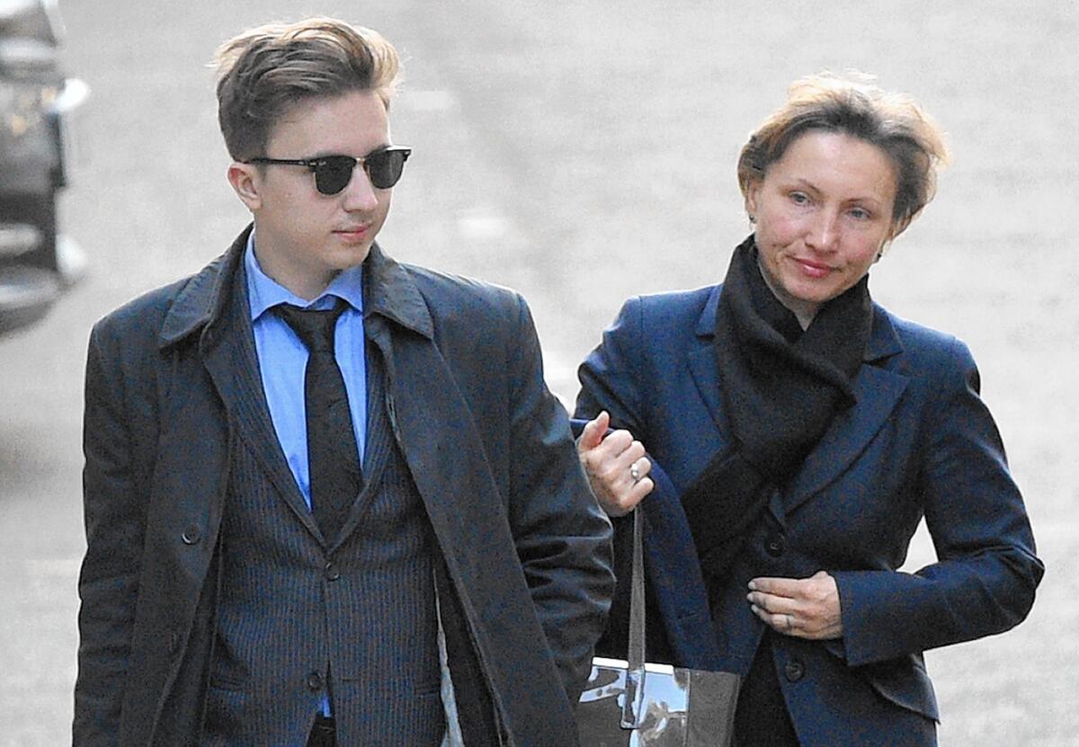 The son and widow of Alexander Litvinenko, Anatoly and Marina, arrive at the Royal Courts of Justice in London this month.
