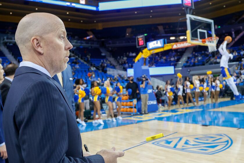 UCLA head coach Mick Cronin watches during a warm up before an NCAA college basketball game.
