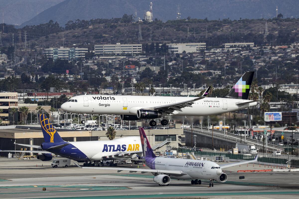 A Volaris plane lands at Los Angeles Airport on November 30, 2019, Los Angeles. 